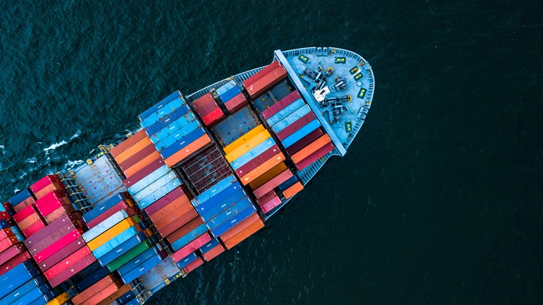 Aerial top view container cargo ship in import export business logistic and transportation of international by container cargo ship in the open sea, with copy space. - Image 