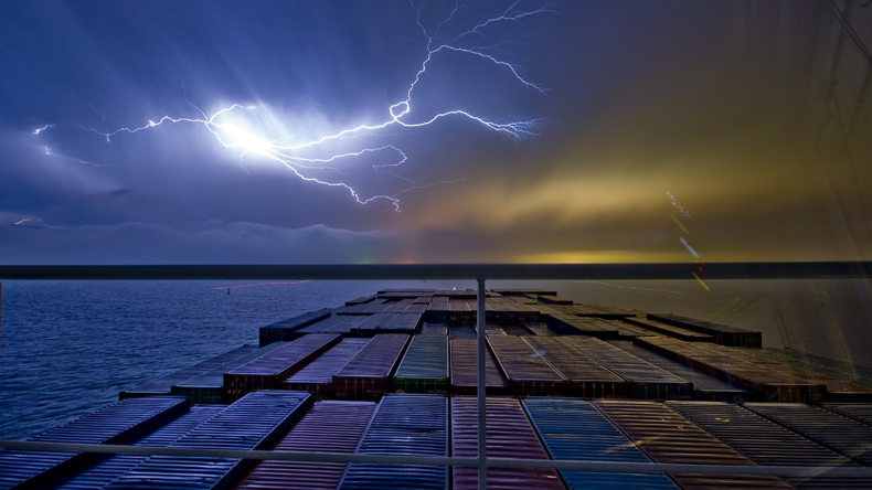 Containership deck and stormy sky