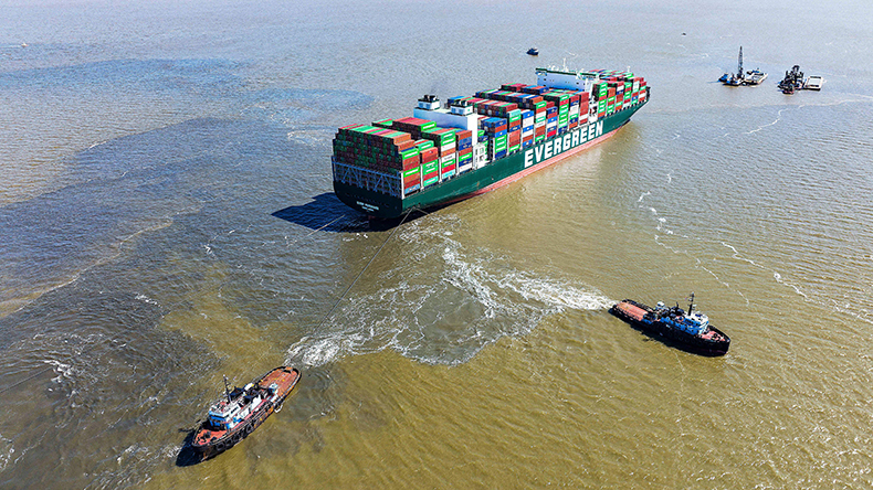 Tugs pull on Ever Forward containership  
