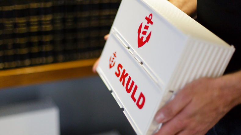 Skuld insurance brand on toy containers