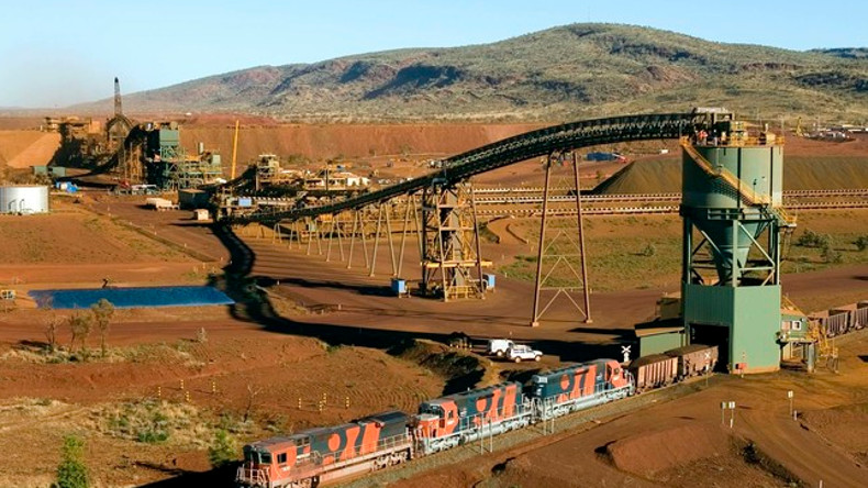 Train destined for Port Hedland, Western Australia is loaded with Australian iron ore