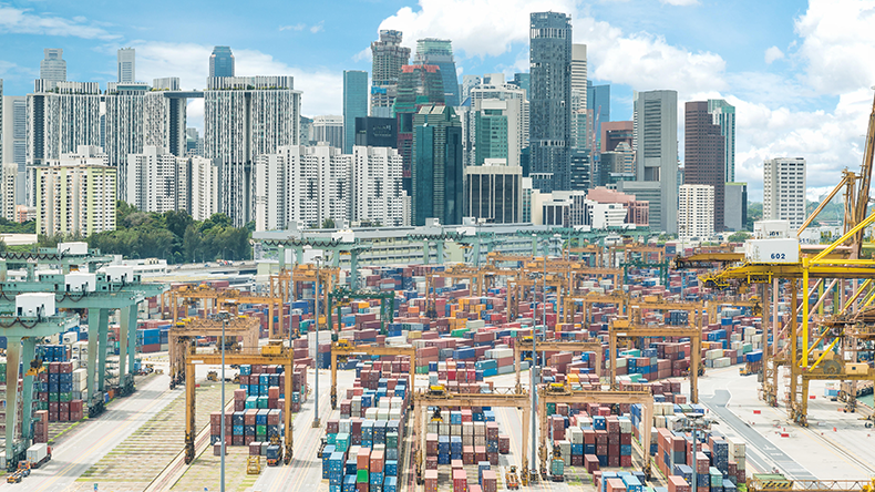 Aerial view of Singapore cargo container port and city