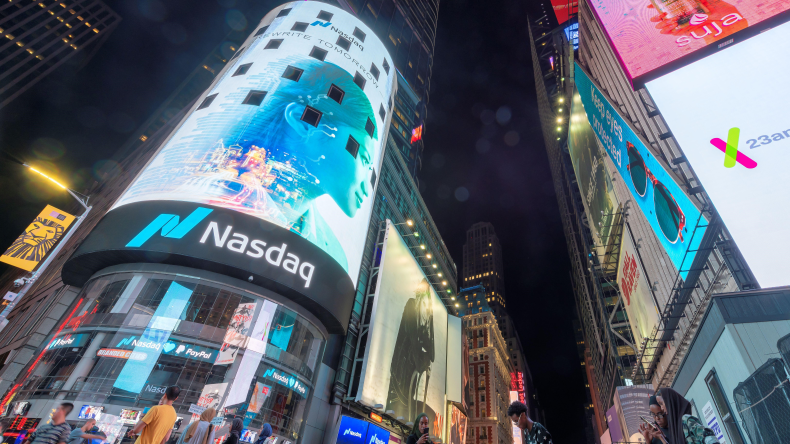 the Nasdaq building in Times Square at night