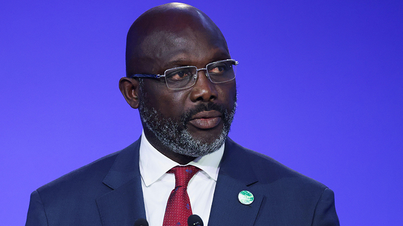 Liberia President George Weah speaks at the opening ceremony for the Cop26 summit at the Scottish Event Campus (SEC) in Glasgow. Picture date: Monday November 1, 2021. Alamy 2H4A331 Credit: Yves Herman / PA Images / Alamy Stock Photo 