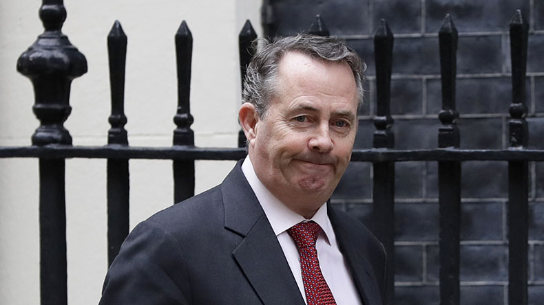 Britain's Secretary of State for International Trade Liam Fox arrives in Downing Street to attend a cabinet meeting, in London, Tuesday, March 13, 2018.