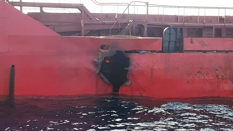 Hole in side of Verbena vessel caused by cruise missile