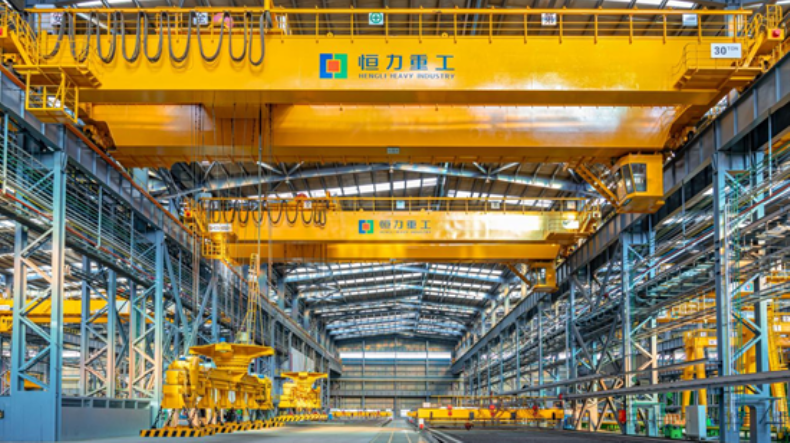 Hengli Heavy Industry shipbuilding yard with orange gantry cranes 