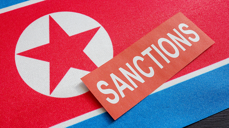  North Korea flag and the word sanctions. - Image ID: 2GPG1JY Credit: designer491 / Alamy Stock Photo 