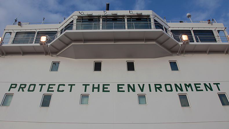 Protect the environment words written on ship