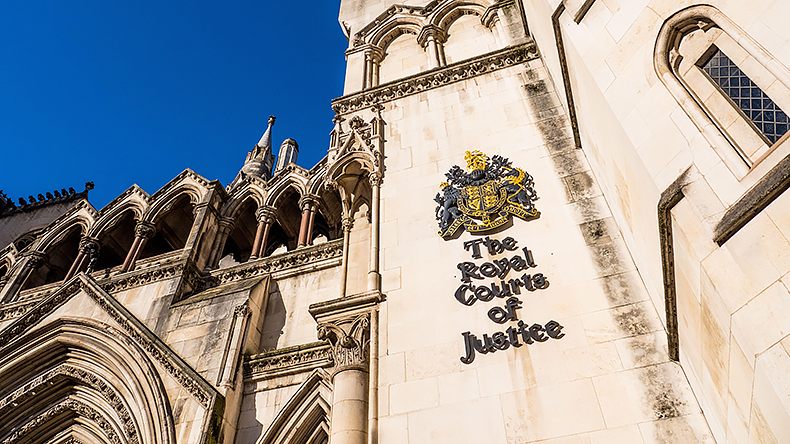 Royal Courts of Justice in London outside view with sunshine