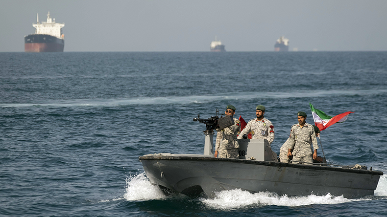 Iranian Navy in an armed speedboat in Middle East Gulf near the Strait of Hormuz
