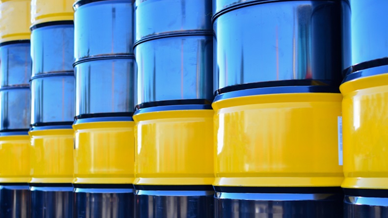 Black oil barrel. Petroleum drum containers. Gasoline barrels